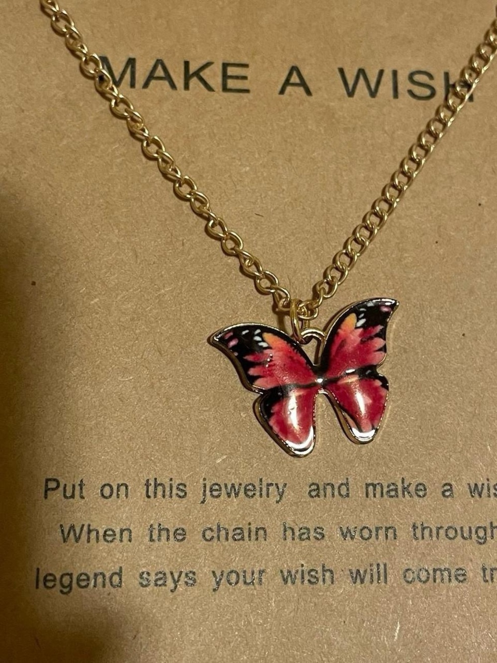 Gold tone orange and hot pink butterfly necklace gift with card.